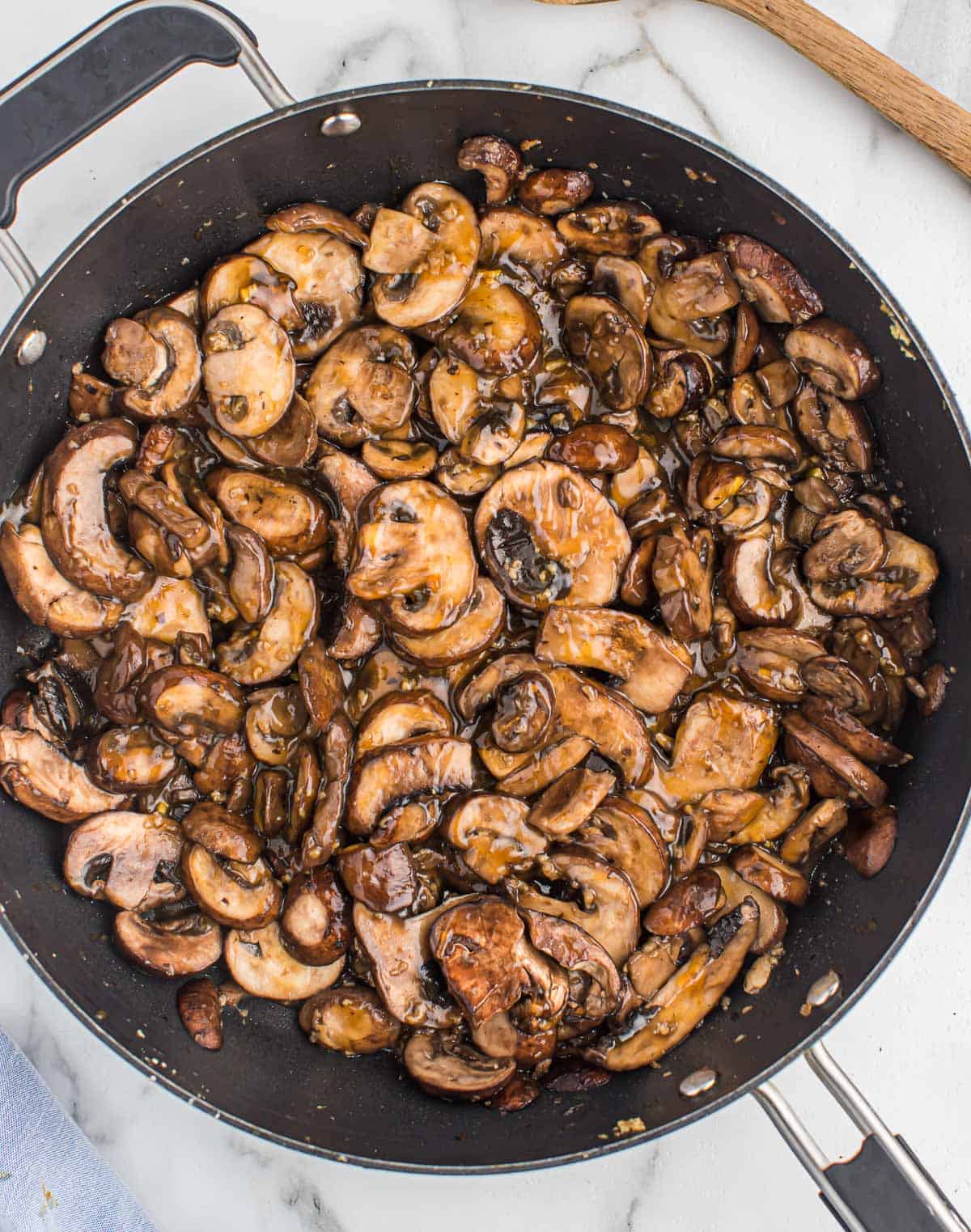 teriyaki fried mushrooms in a skillet