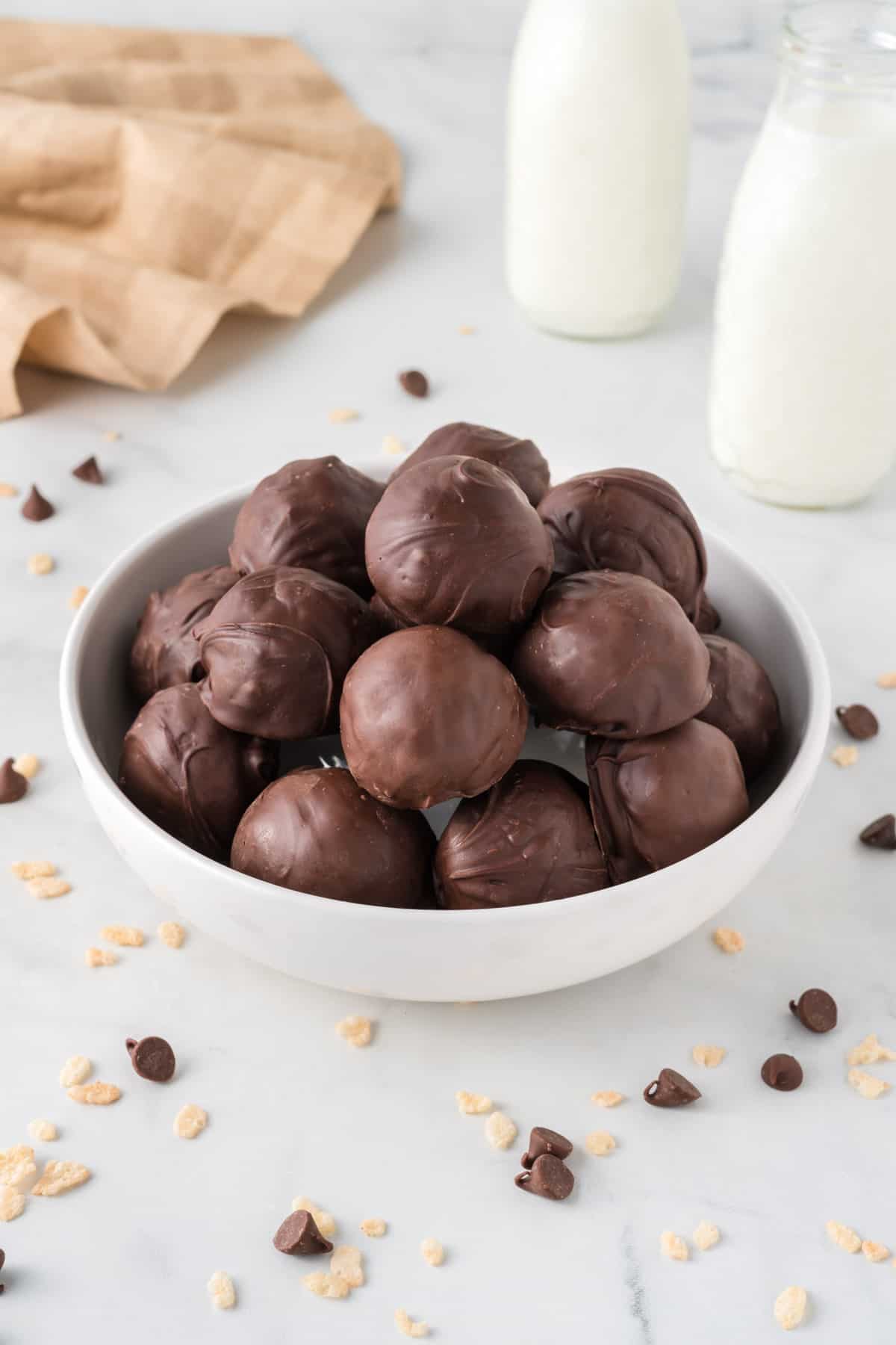 peanut butter balls in a white bowl