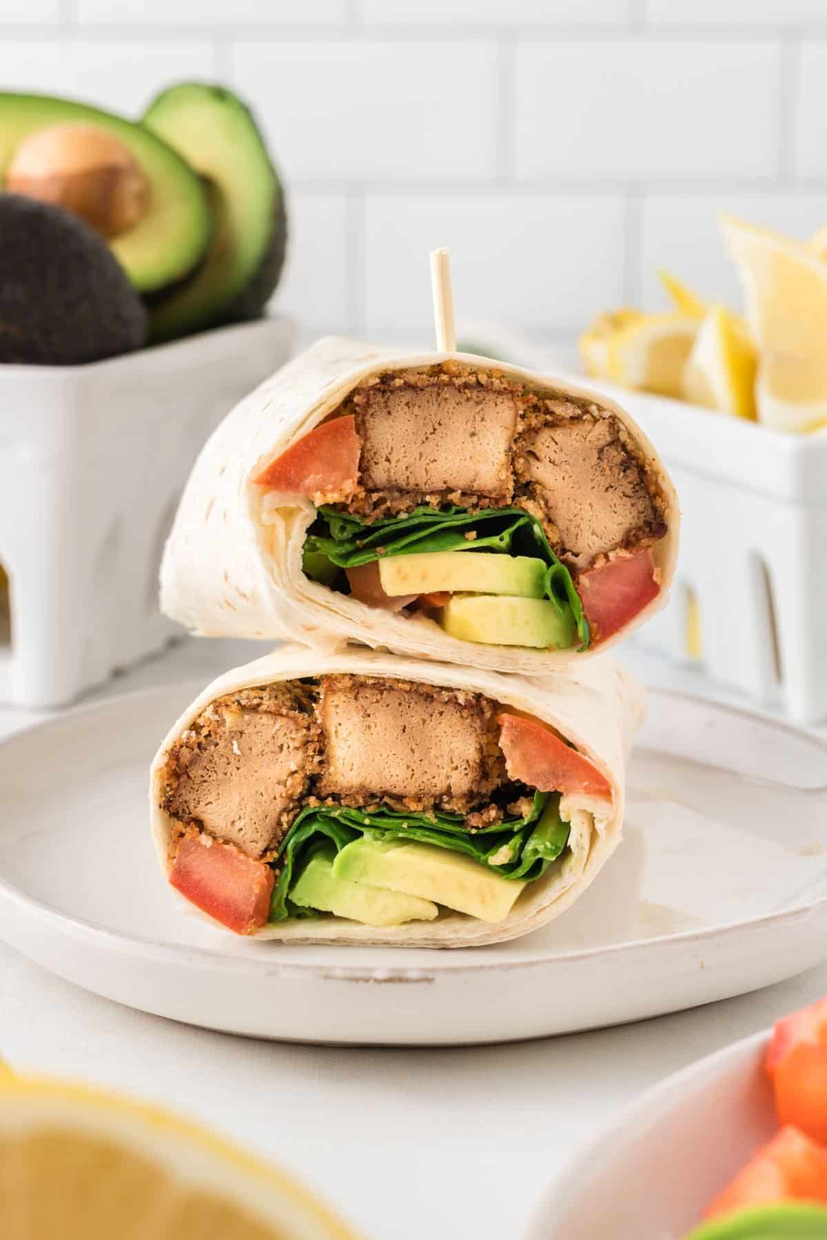 tofu wraps stacked on a plate