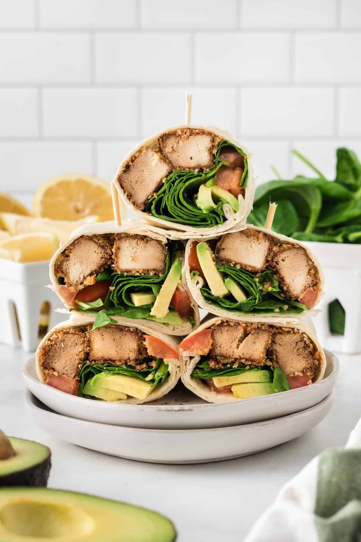 tofu wraps stacked on a plate