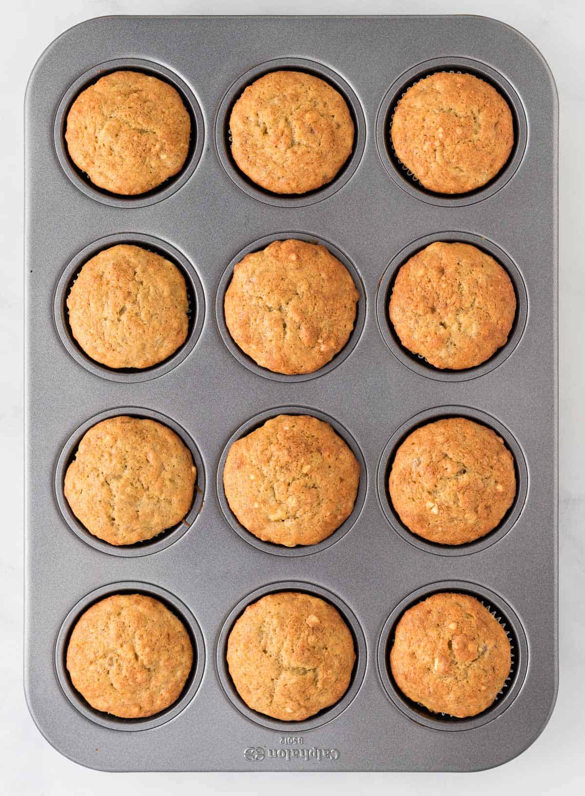 baked banana muffins in the muffin tin