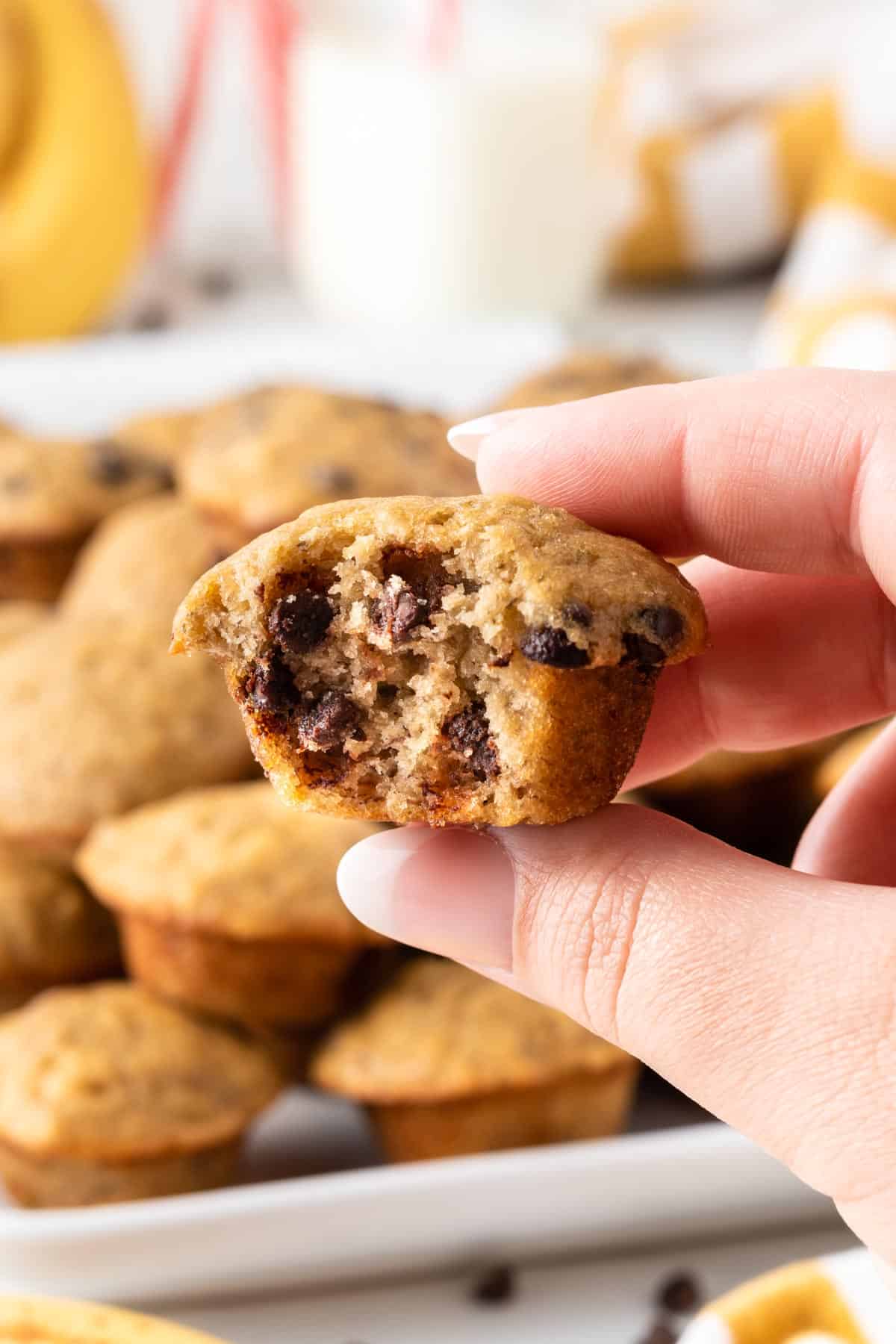 a mini muffin with a bite taken out