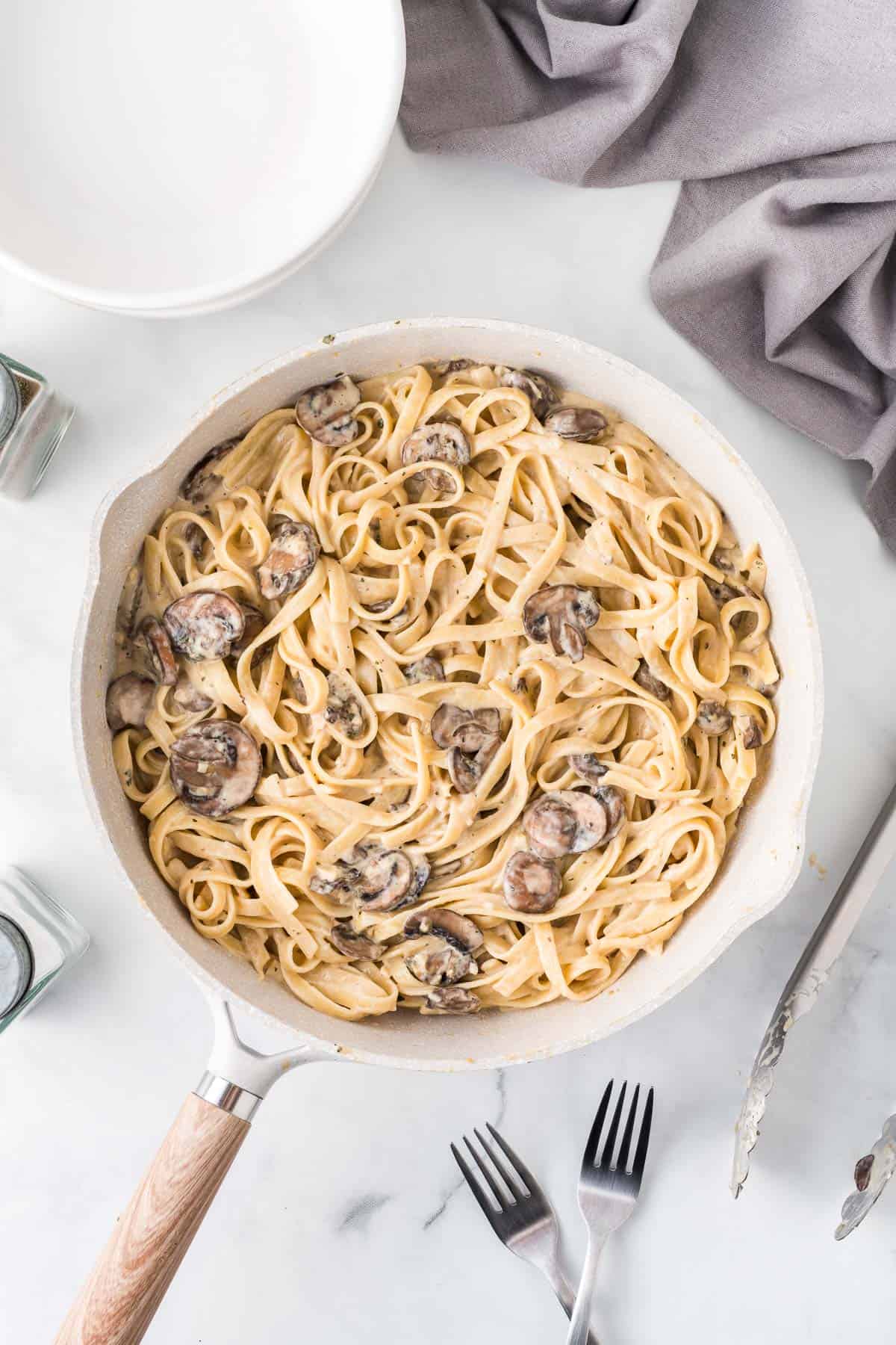 creamy mushroom pasta in a skillet