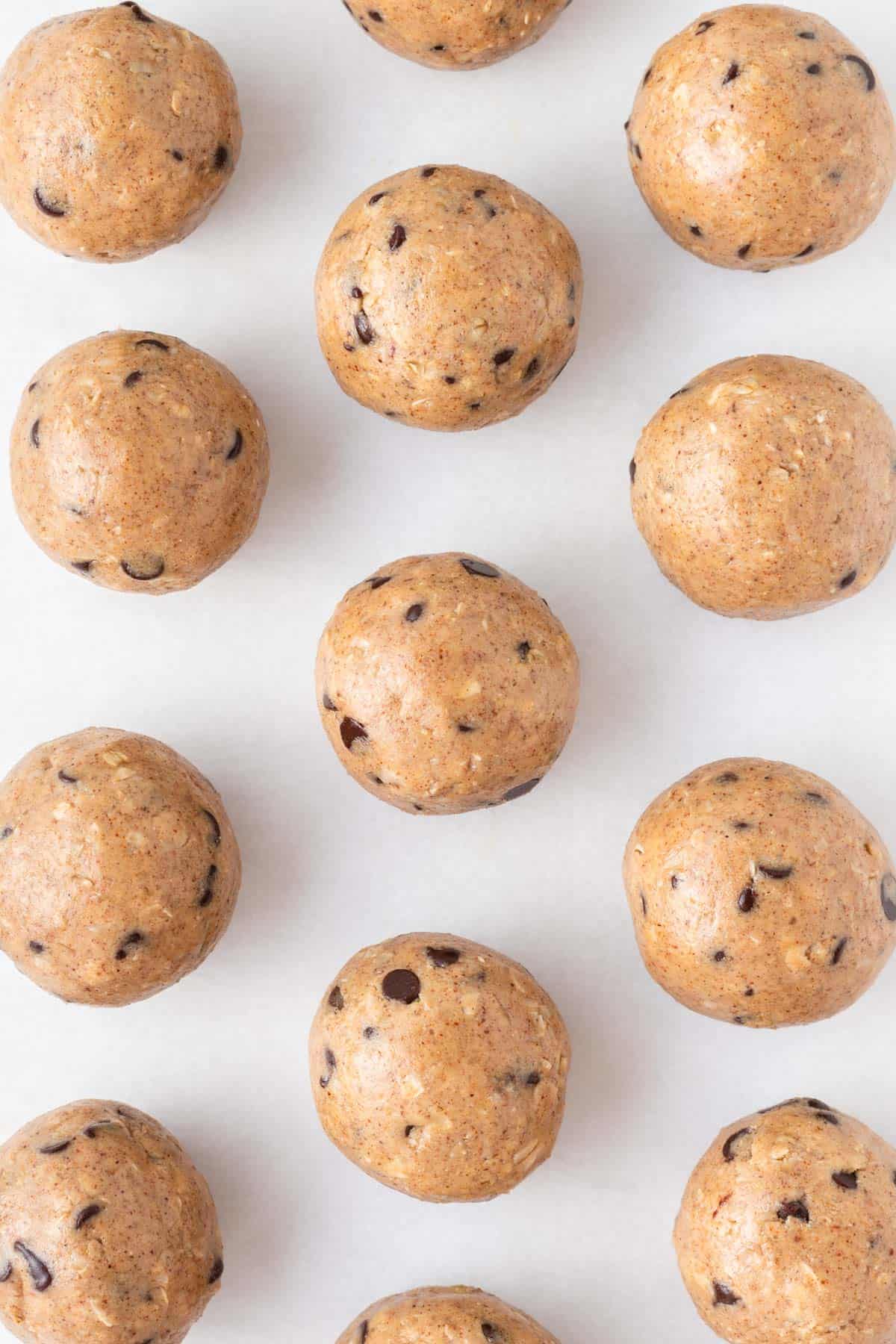 almond butter energy balls on a baking sheet