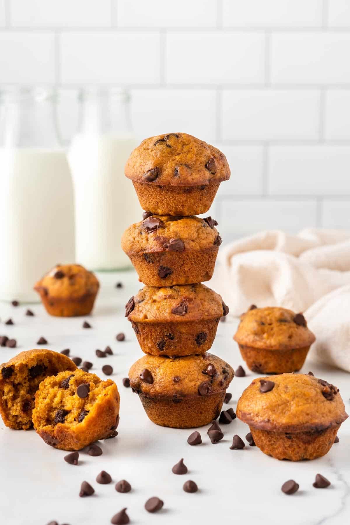 mini pumpkin muffins stacked on top of each other