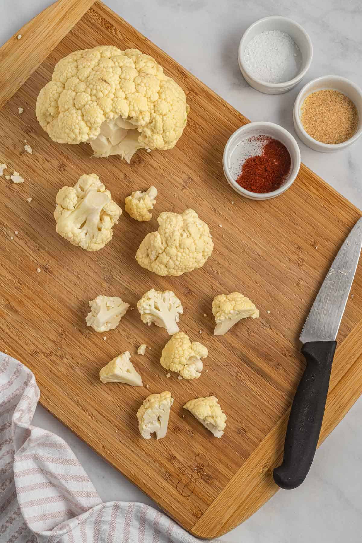 cutting the cauliflower into florets