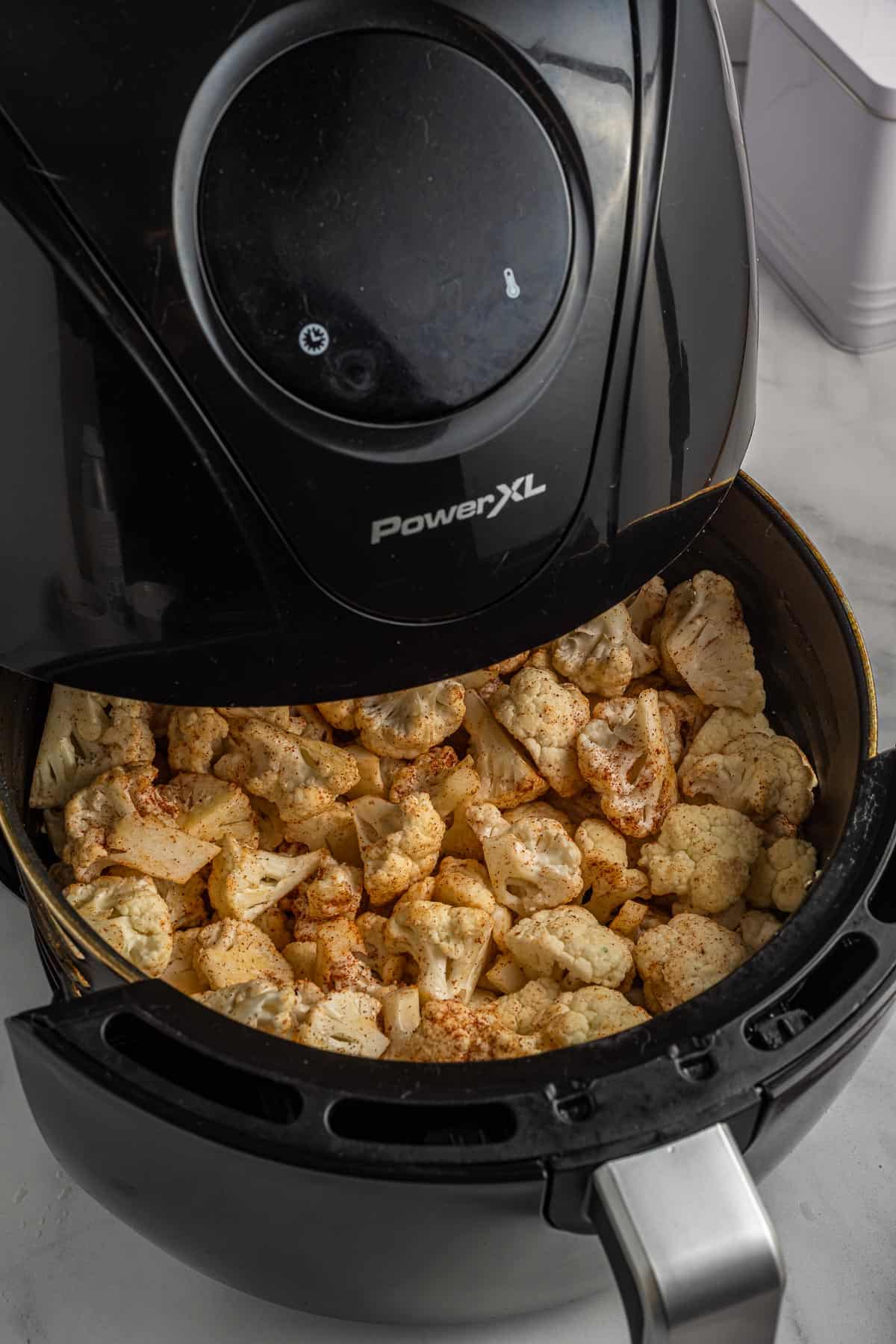 cauliflower in the air fryer basket