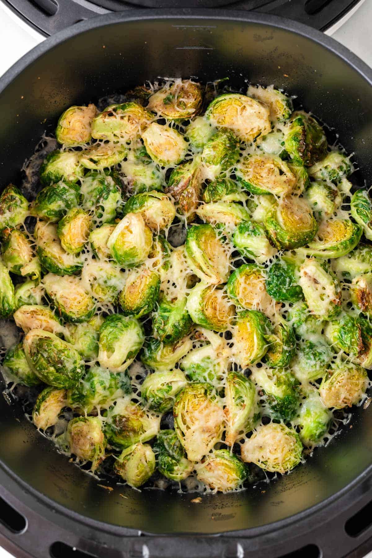 crispy brussels sprouts in the air fryer basket