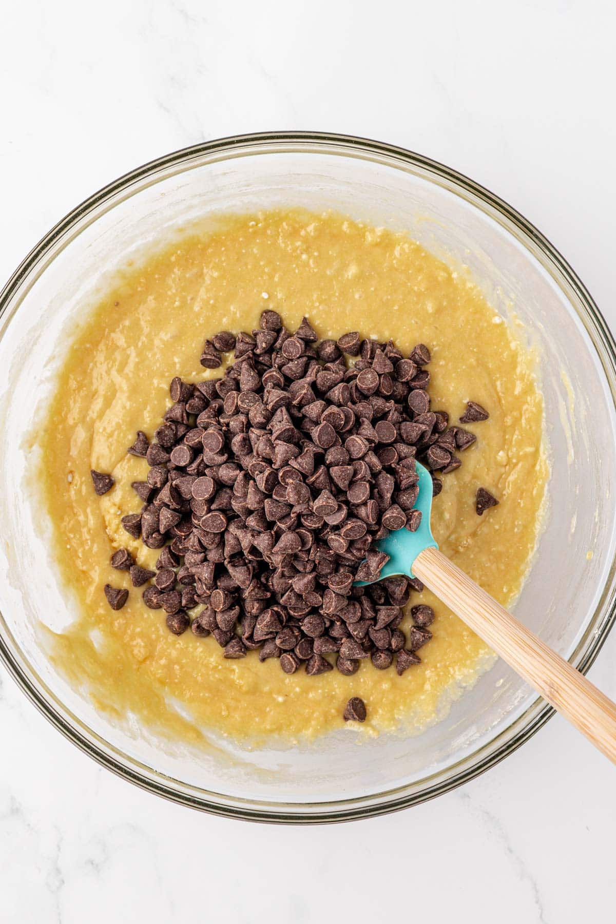 folding the chocolate chips into the batter