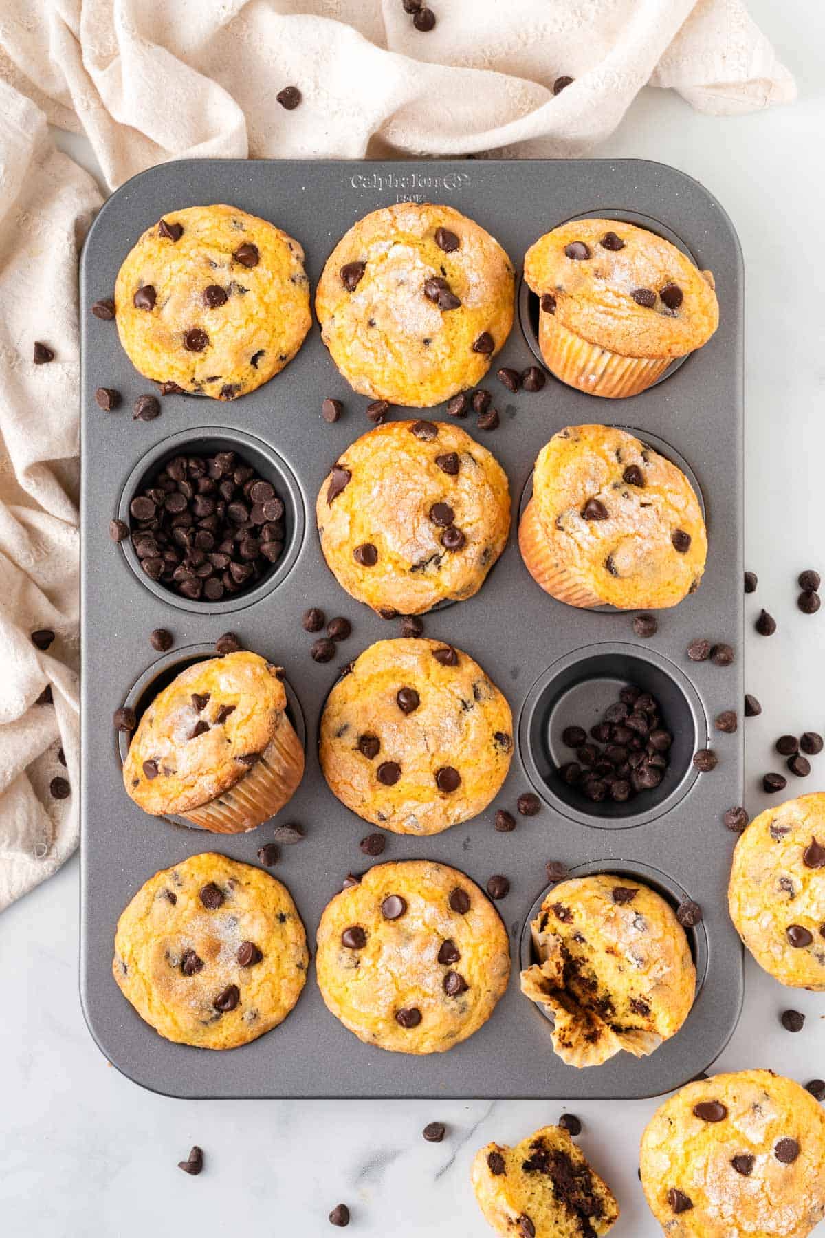 chocolate chip muffins in a muffin tin