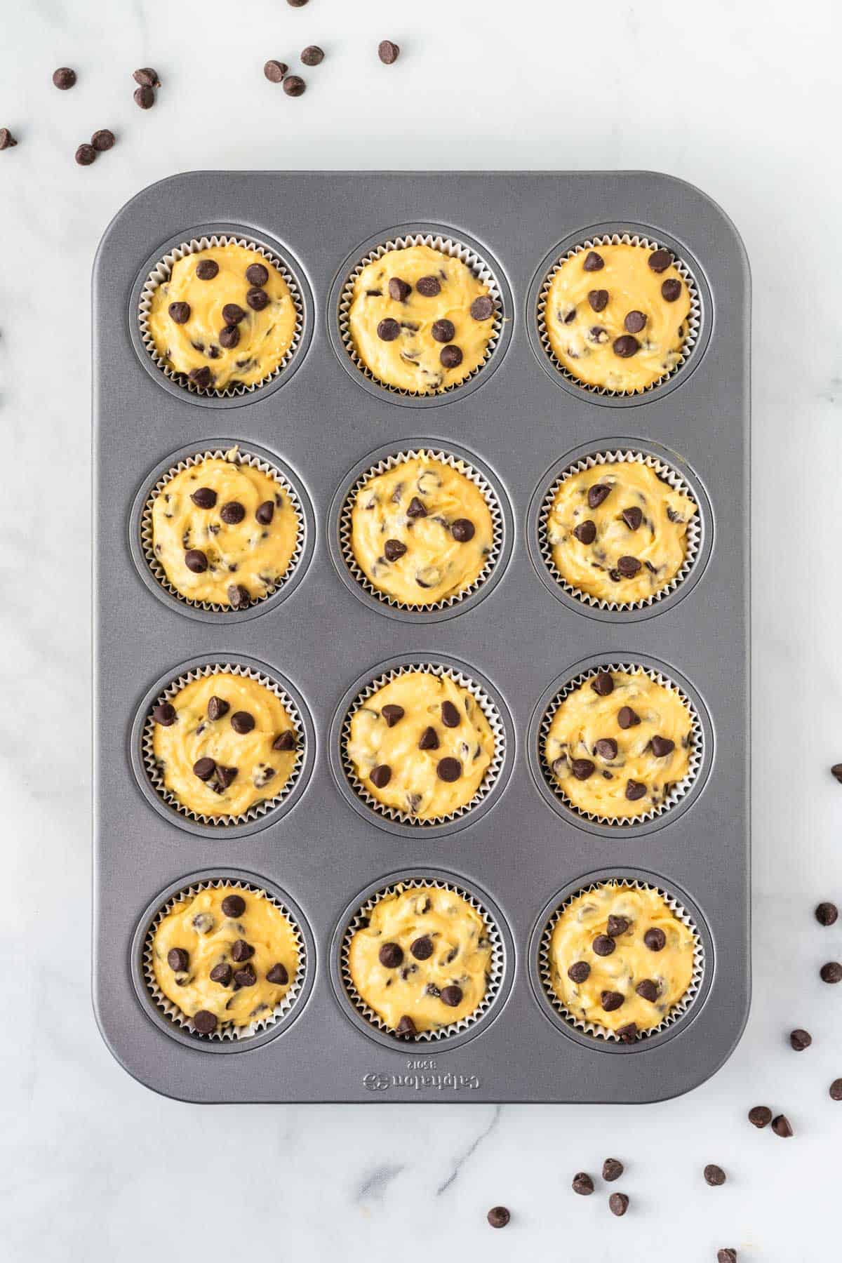 muffin tin filled with batter