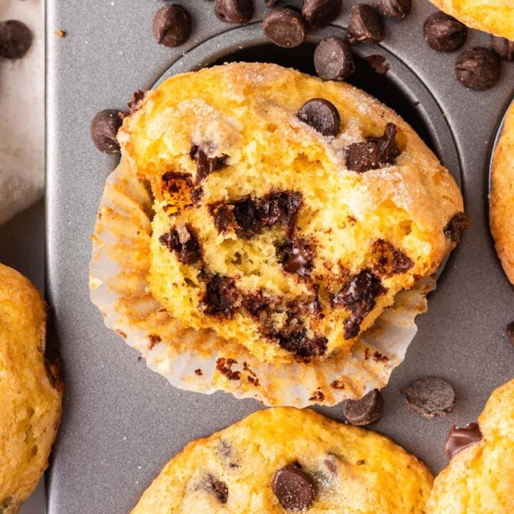 chocolate chip muffin with a bite taken out to show the inside