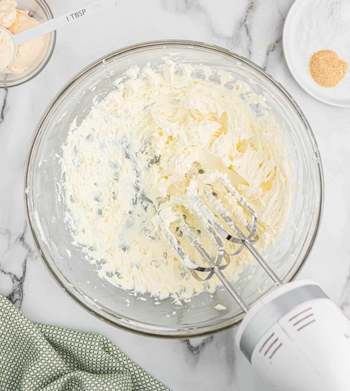 cream cheese whipped together in a bowl