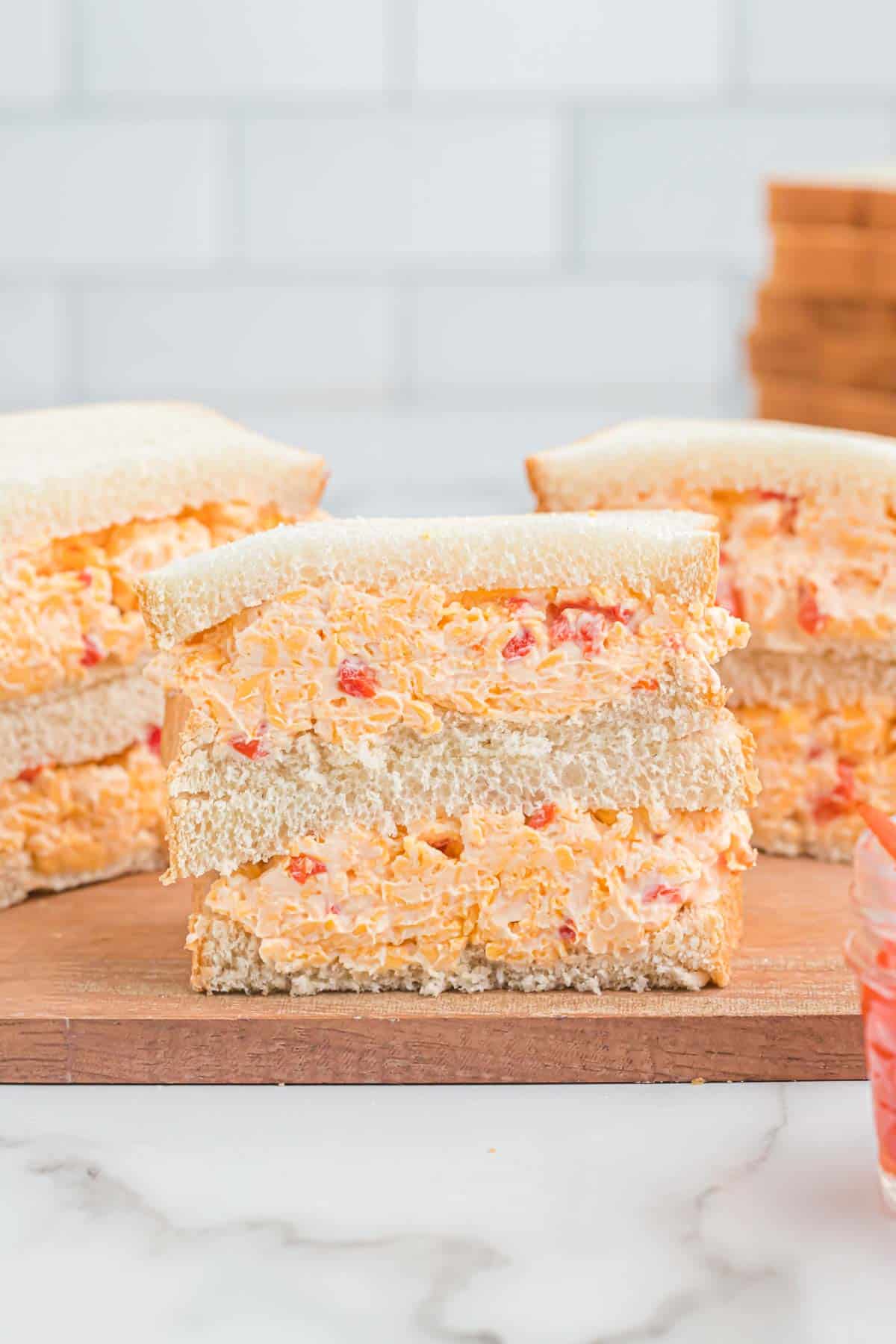pimento cheese sandwich cut in half and stacked