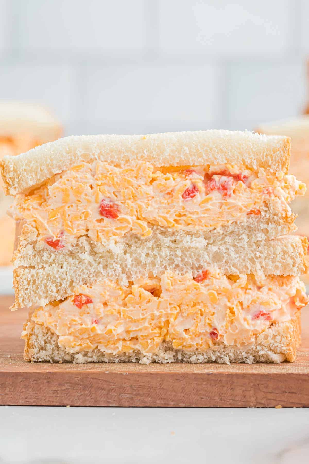 pimento cheese sandwich cut in half and stacked