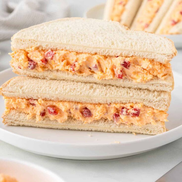 pimento cheese sandwich cut in half and stacked