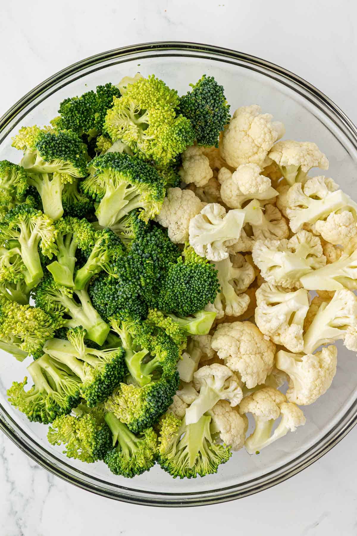 broccoli and cauliflower in a mixing bowl