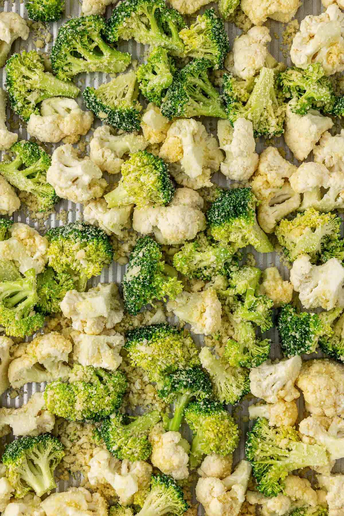 broccoli and cauliflower on a baking sheet