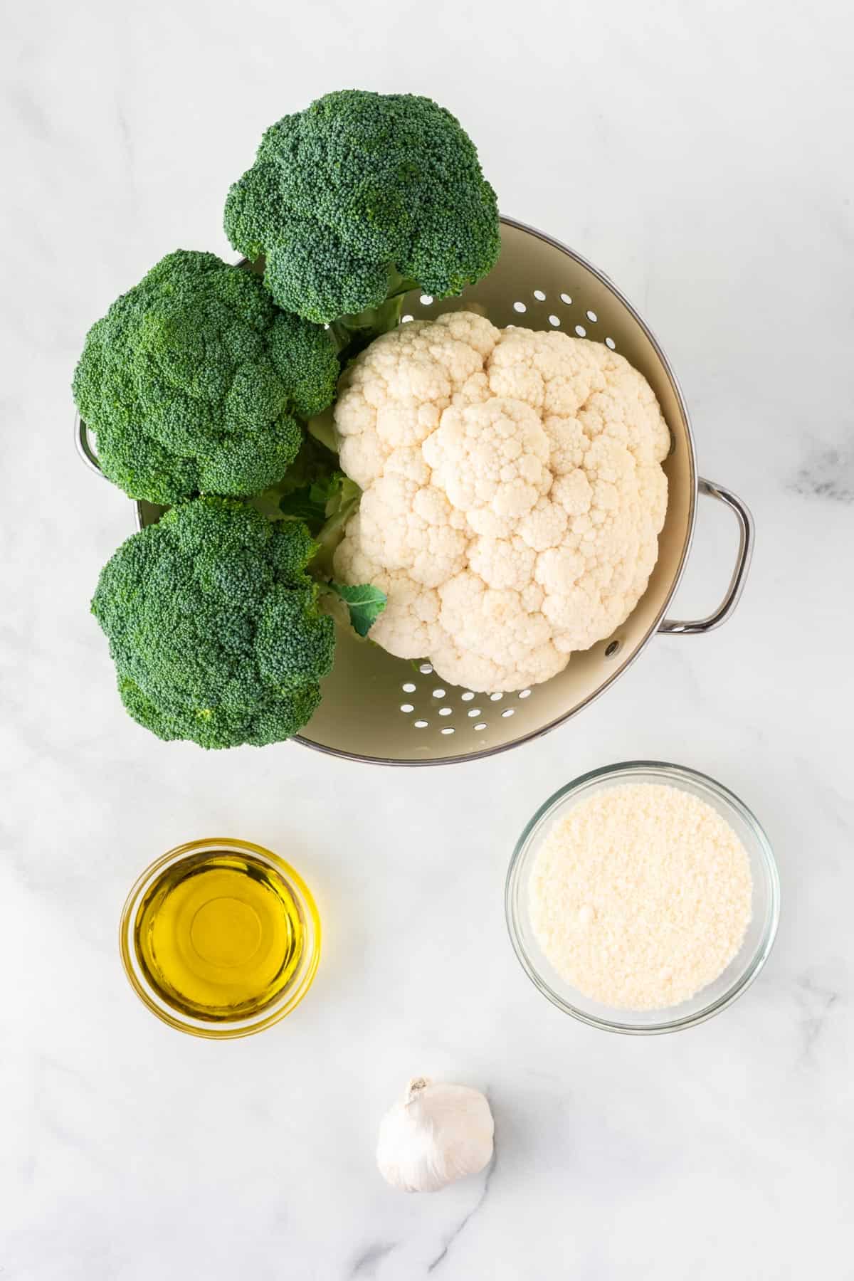 broccoli, cauliflower, garlic, olive oil, and parmesan cheese