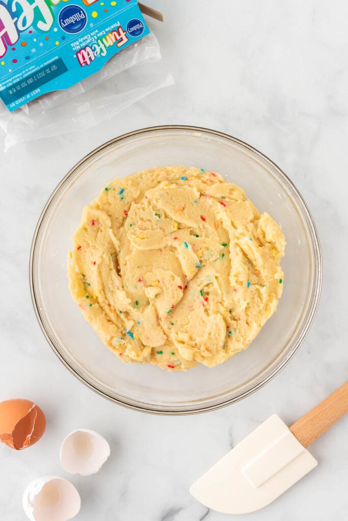 cake mix funfetti cookie batter in a bowl