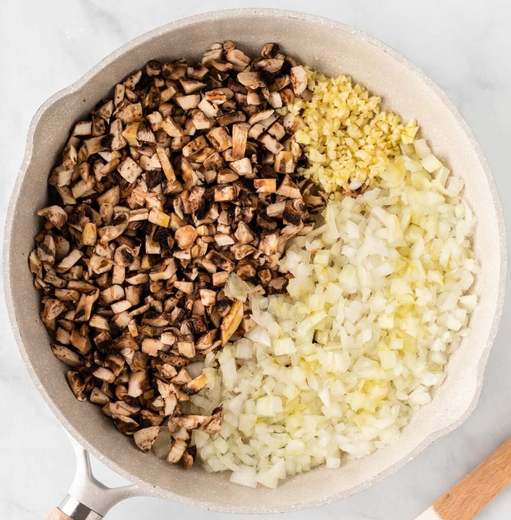 mushrooms, garlic, and onion in a skillet