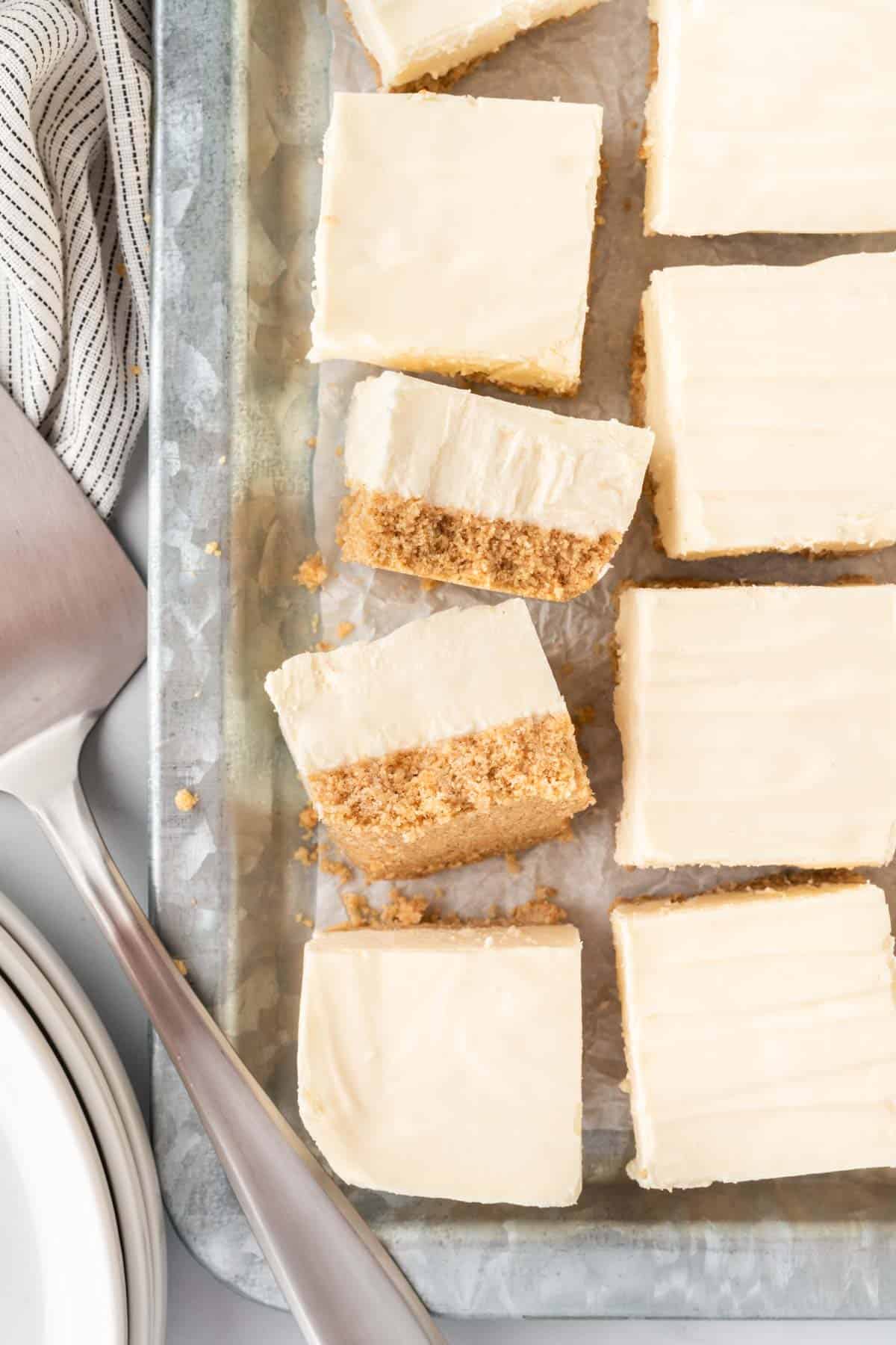 no bake cheesecake bars cut into squares