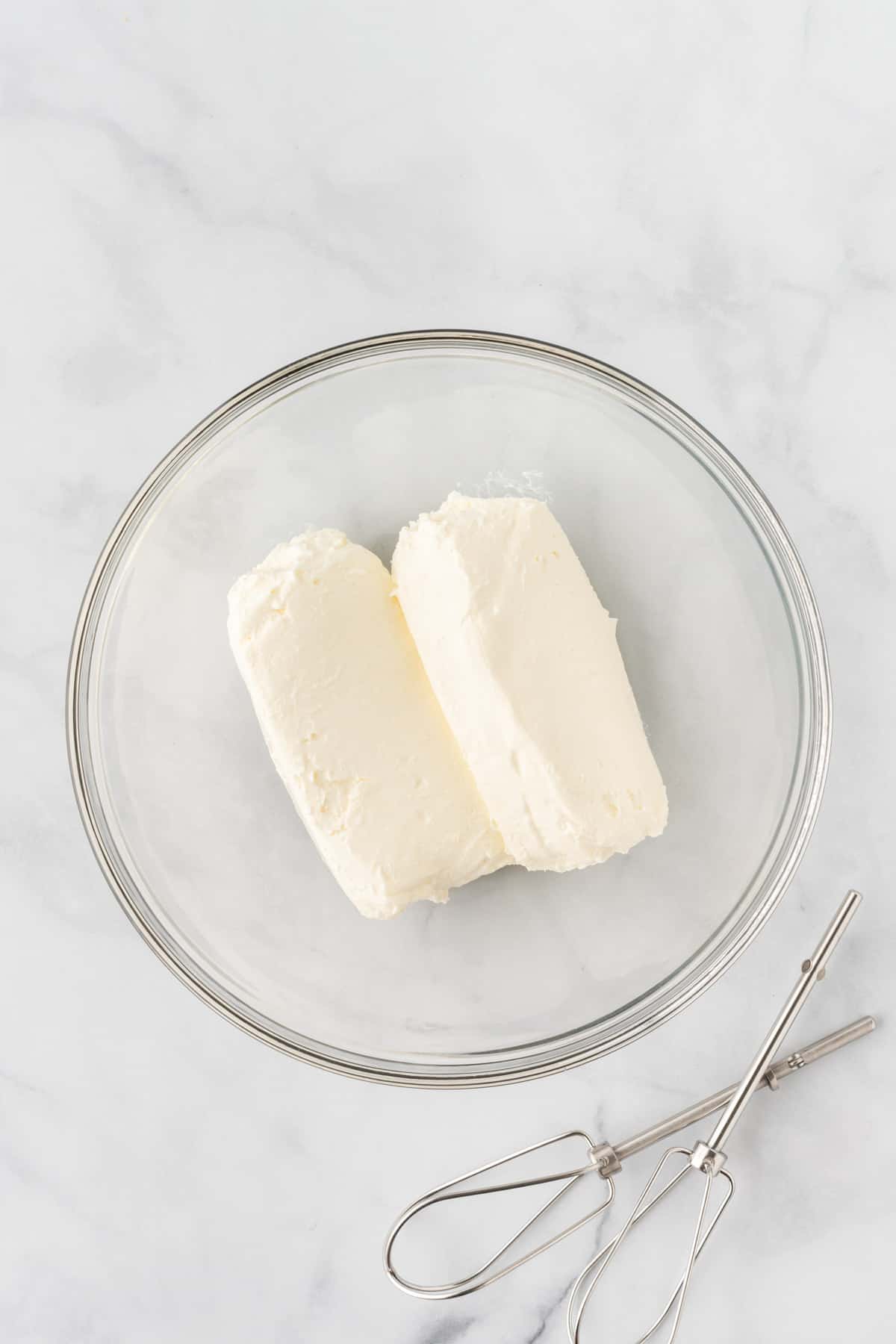 cream cheese blocks in a bowl