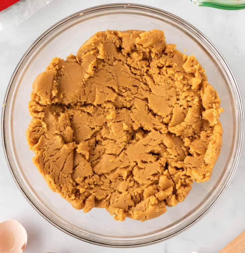 peanut butter cookie batter in a mixing bowl