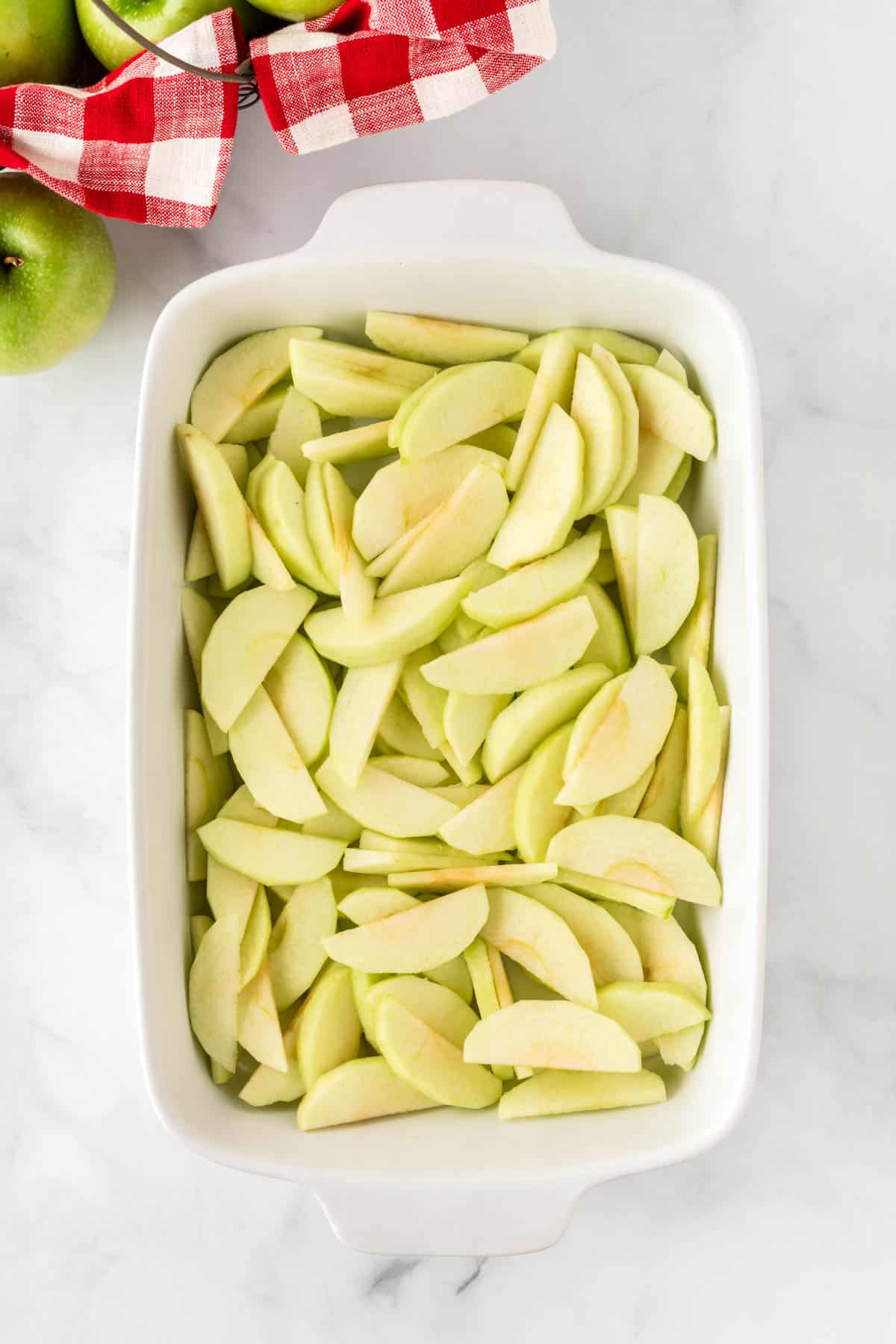 apple slices in a baking dish