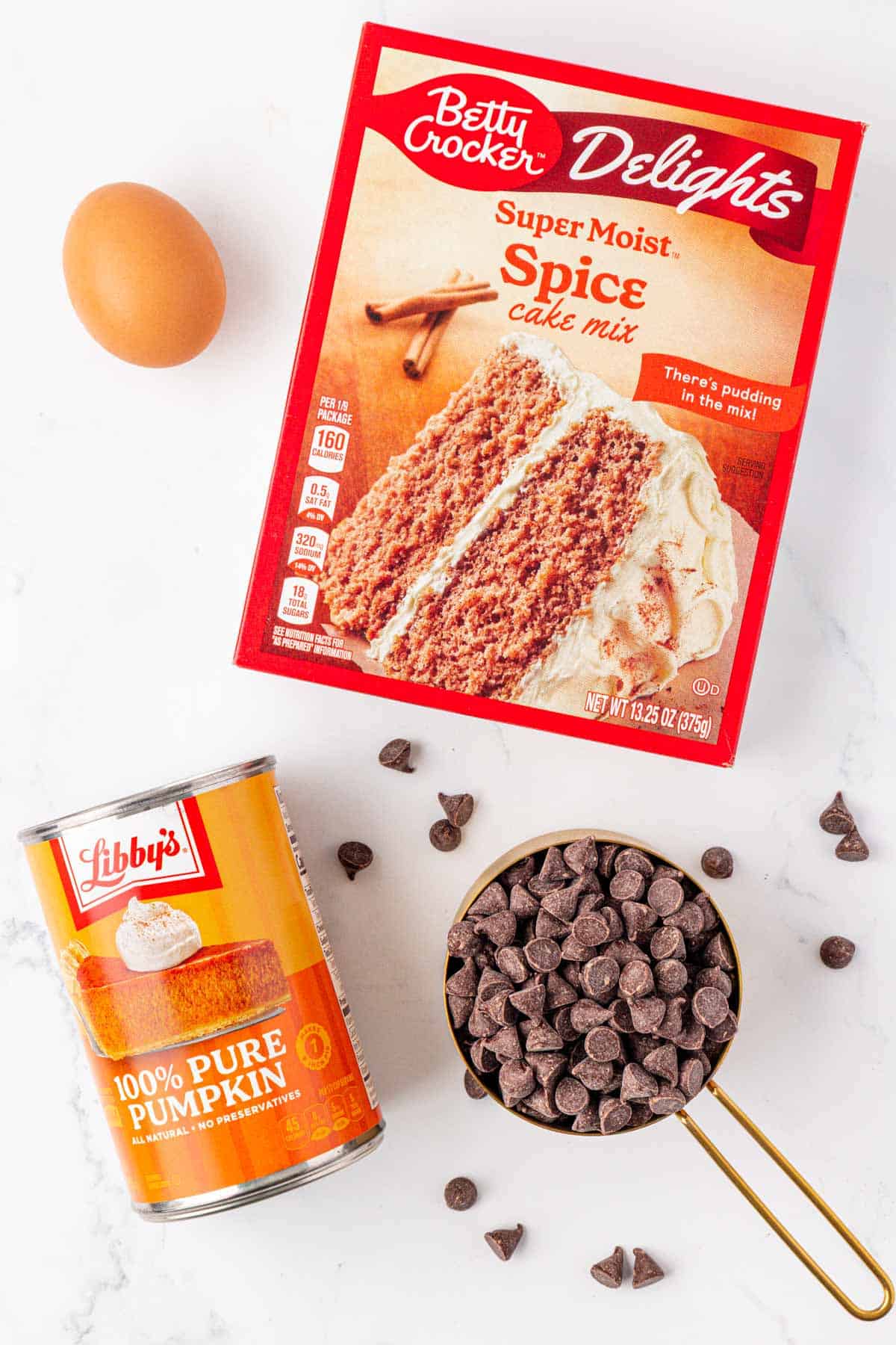 egg, spice cake mix, chocolate chips, and canned pumpkin