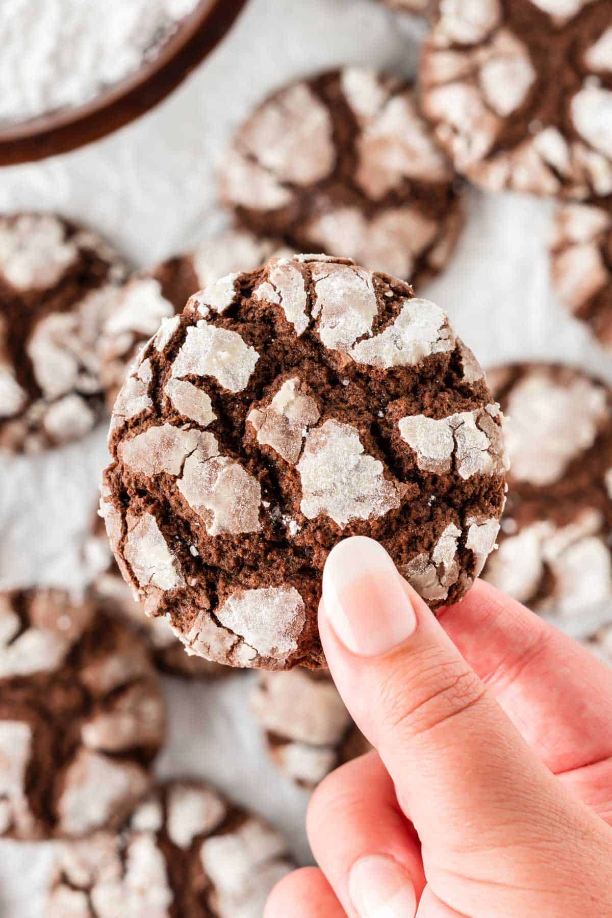 holding a crinkle cookie