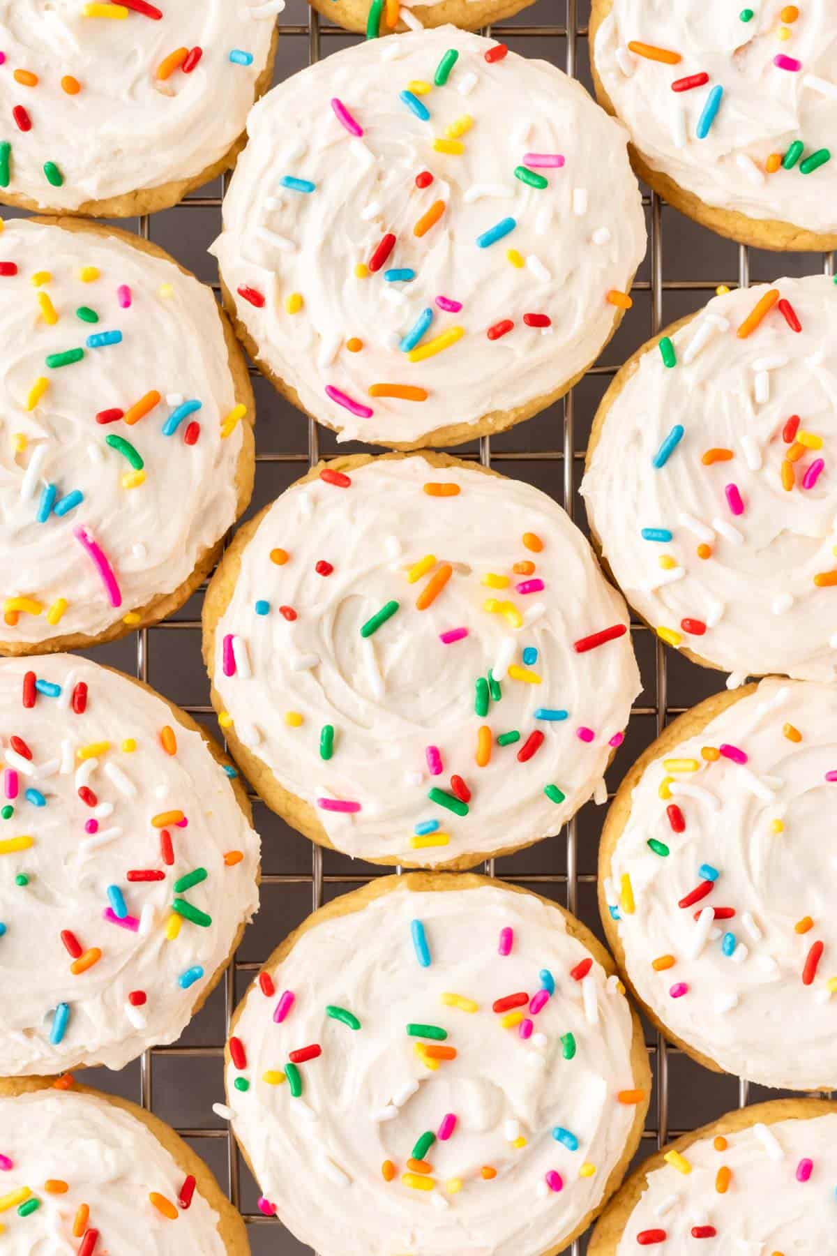 frosted sugar cookies with sprinkles