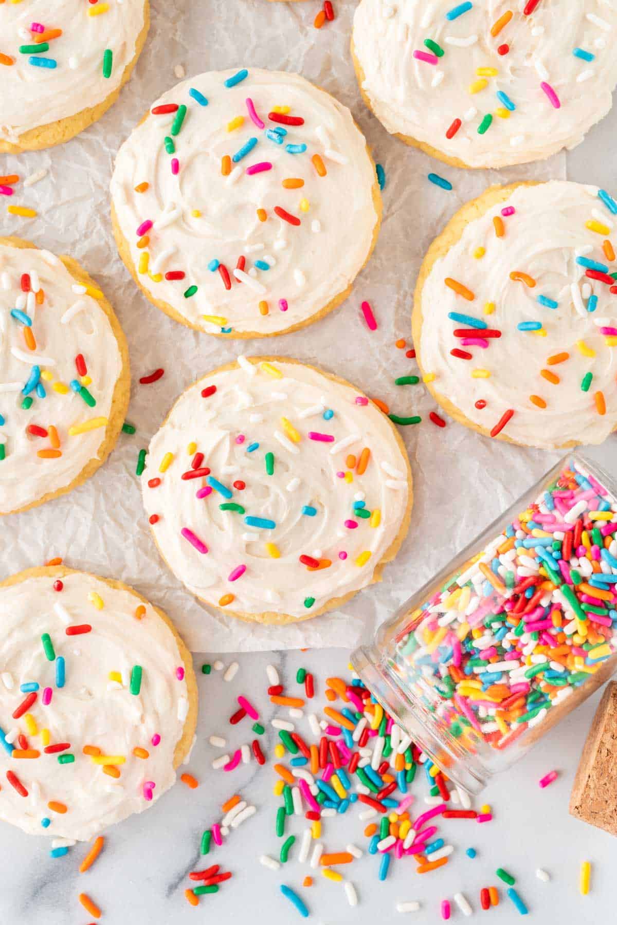 cake mix sugar cookies topped with frosting and sprinkles