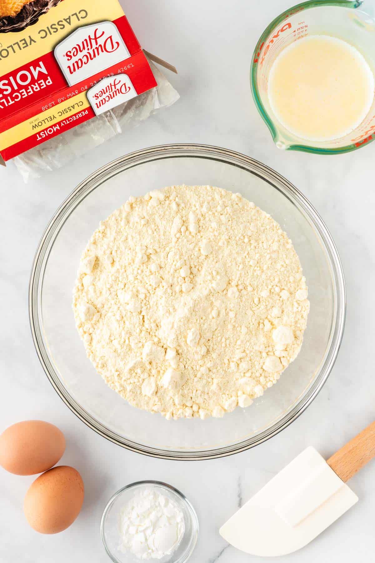 yellow cake mix in a mixing bowl