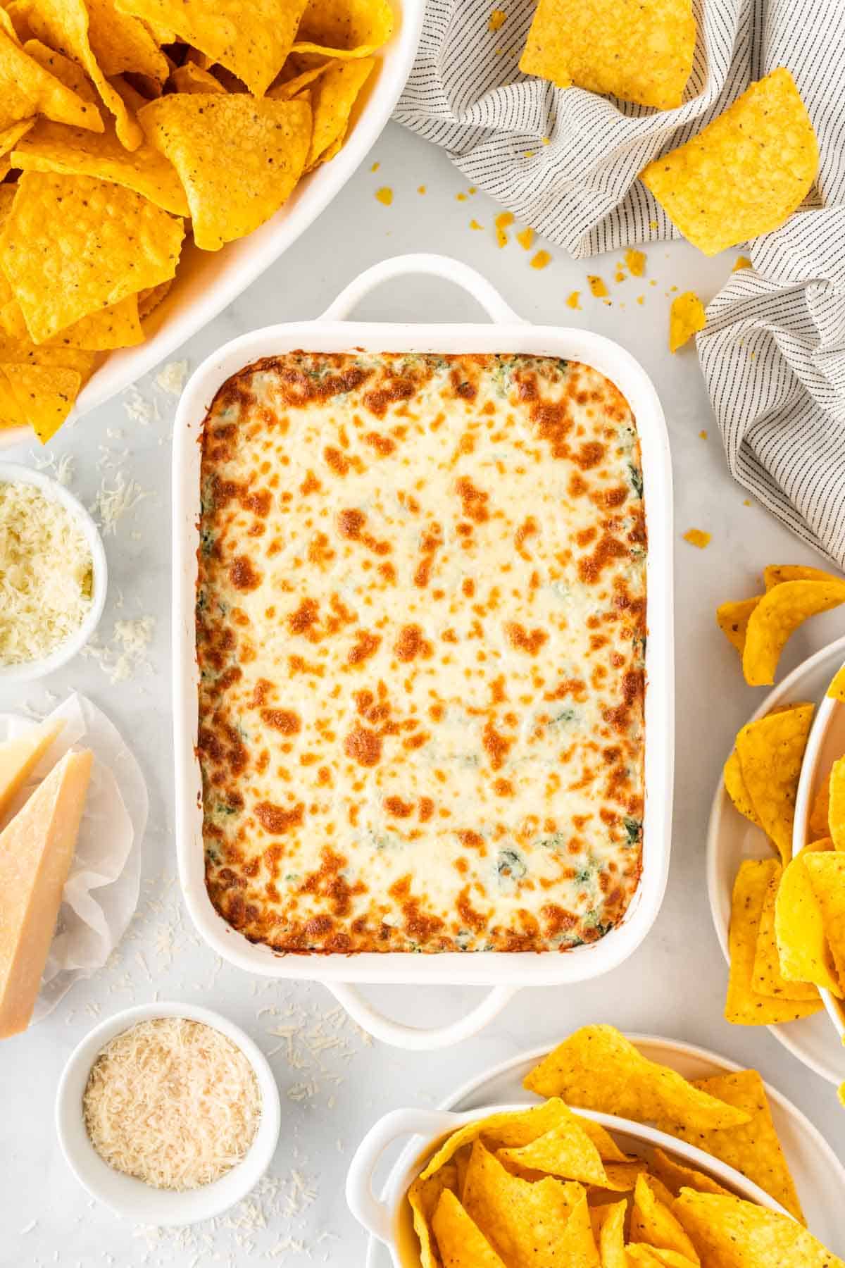 creamy baked spinach dip in a baking dish
