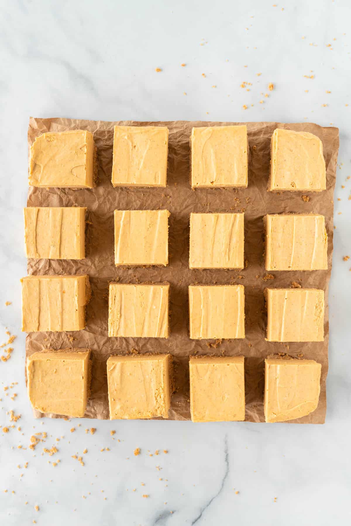 pumpkin cheesecake bars cut into 16 squares