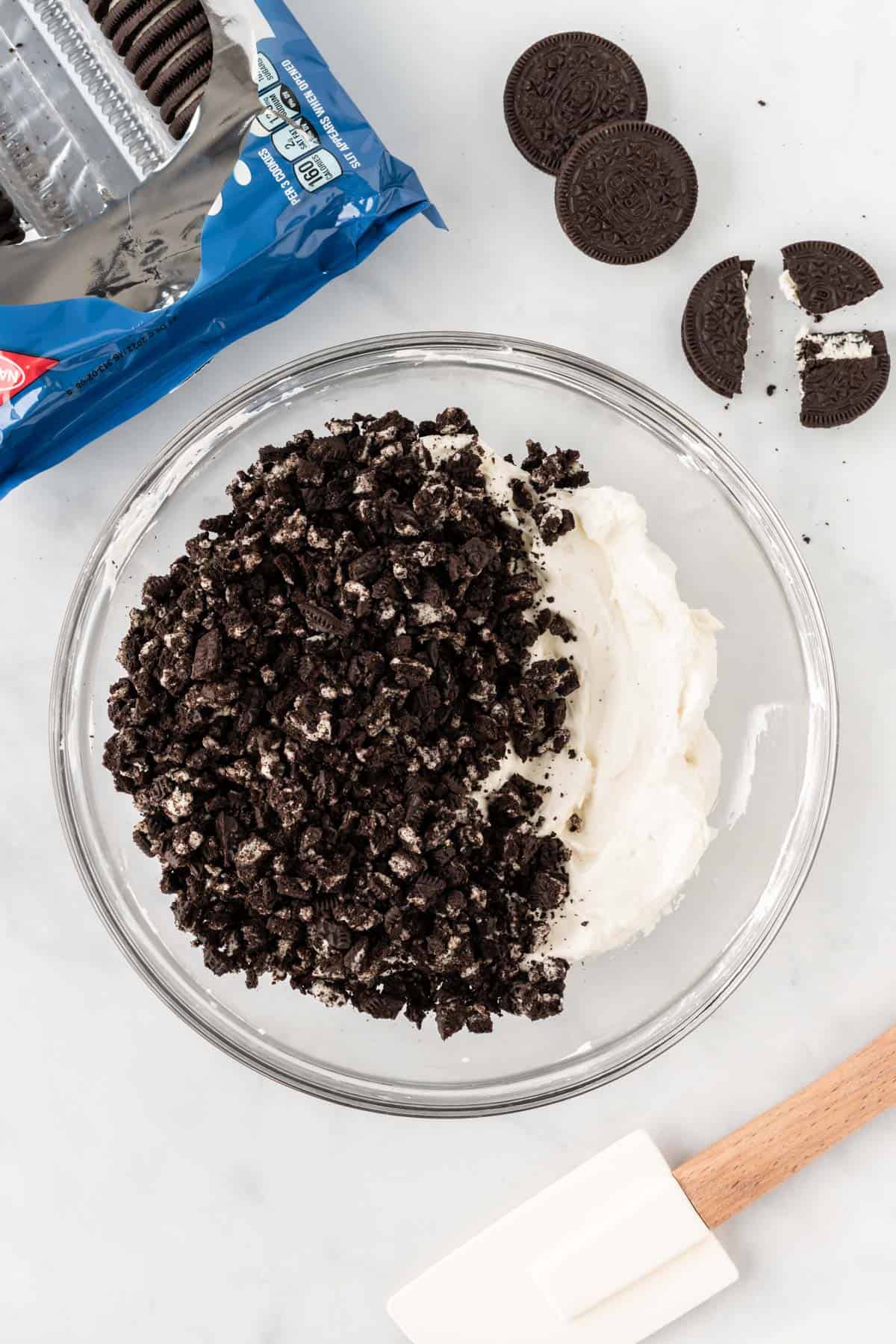 adding crushed oreos to the pie batter