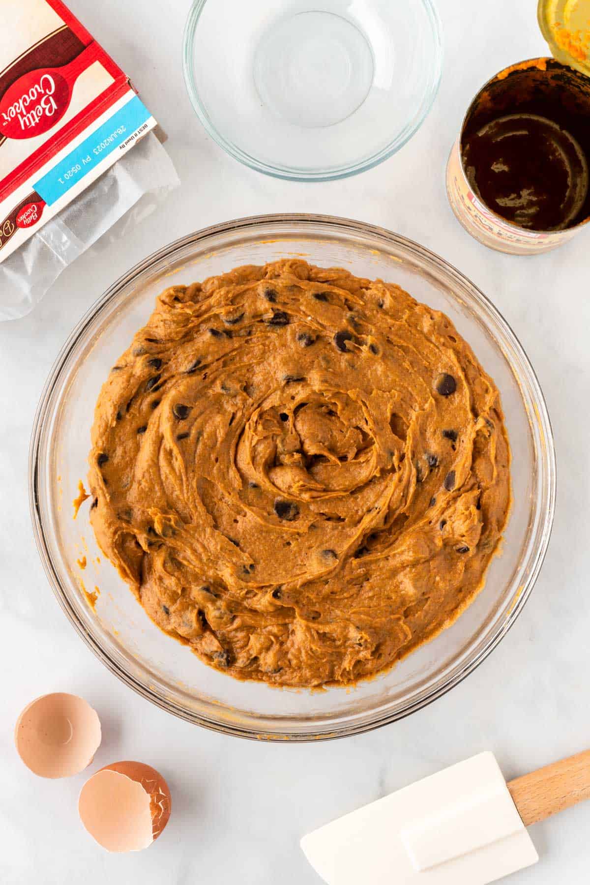 pumpkin cookie batter mixed together in a bowl