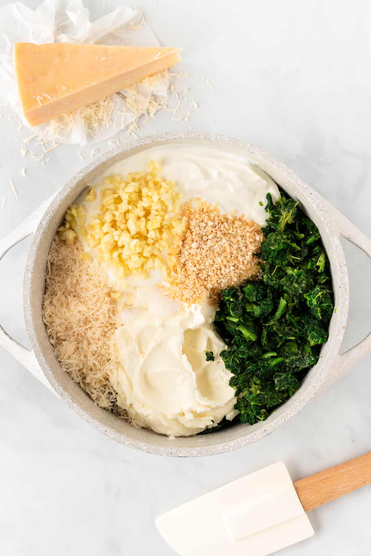 adding the dip ingredients to a sauce pan