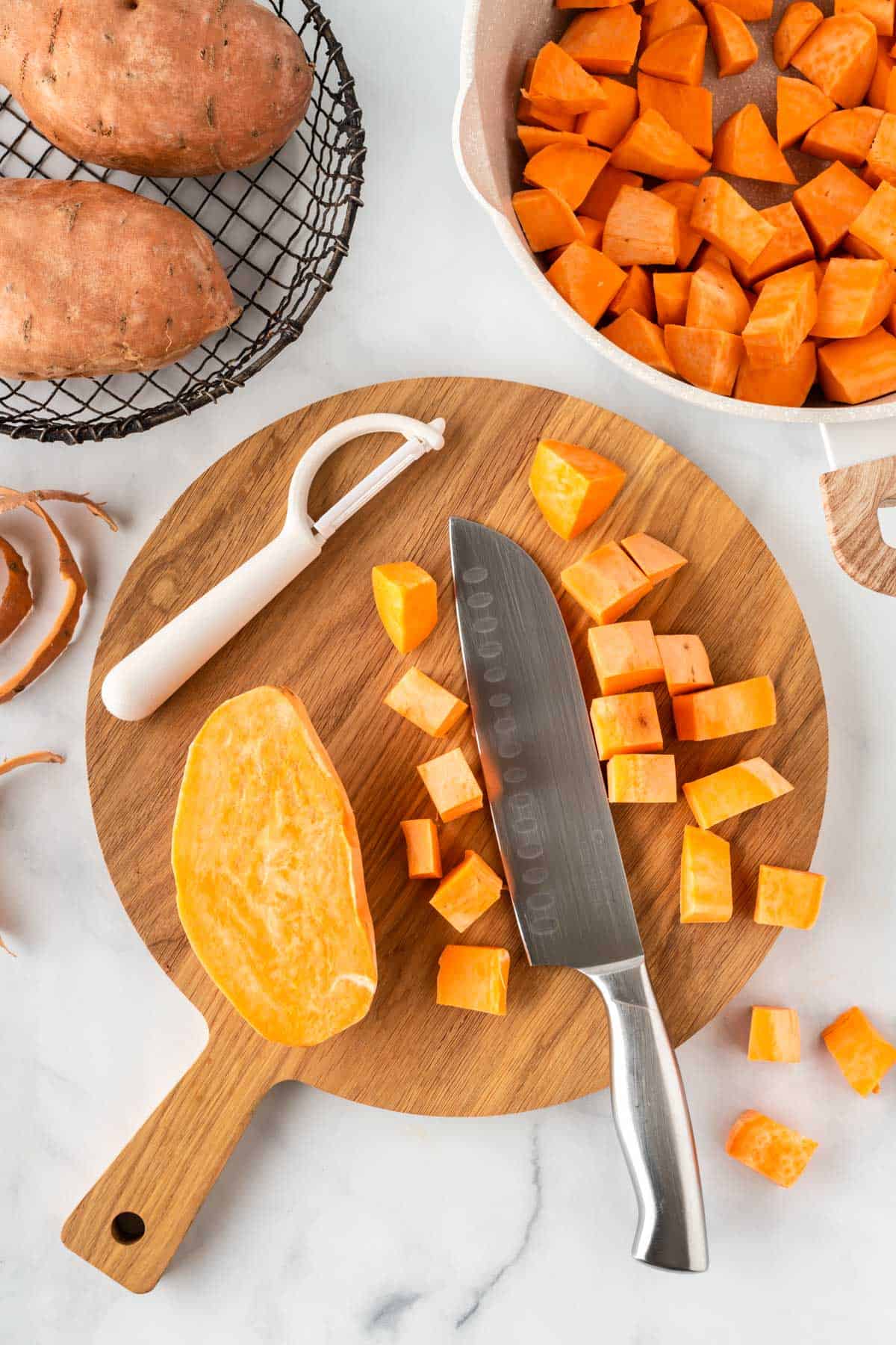 cutting sweet potatoes into chunks