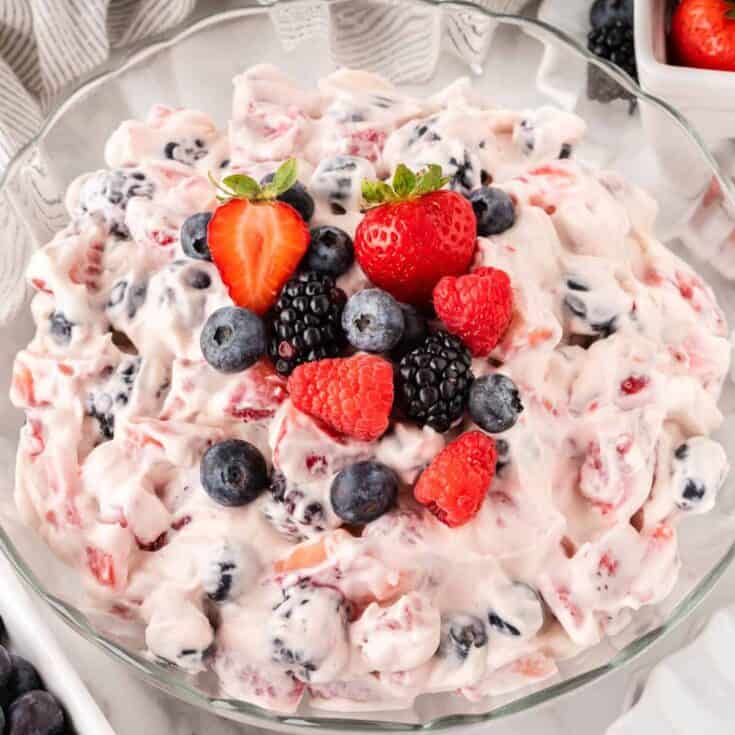 cheesecake salad topped with fresh berries