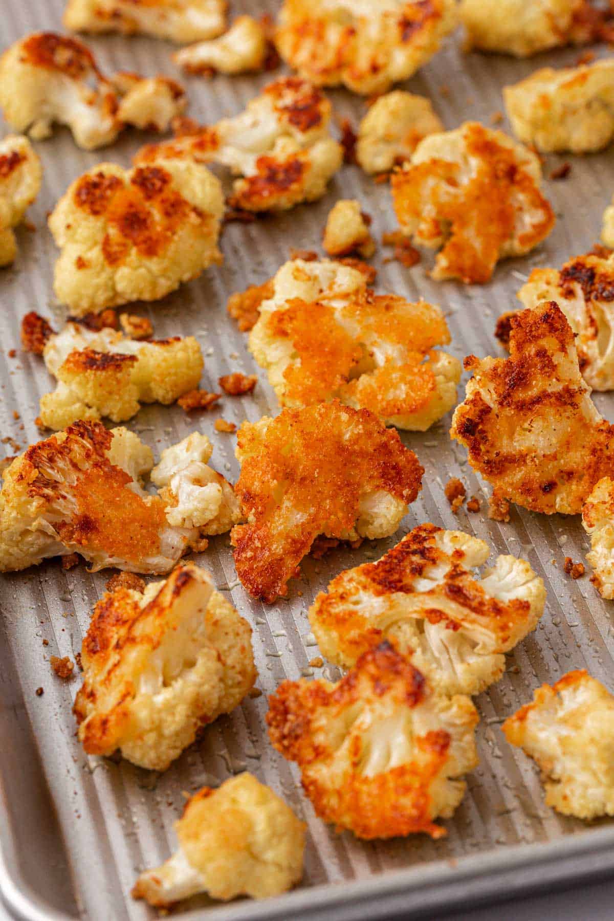 parmesan roasted cauliflower on a baking sheet