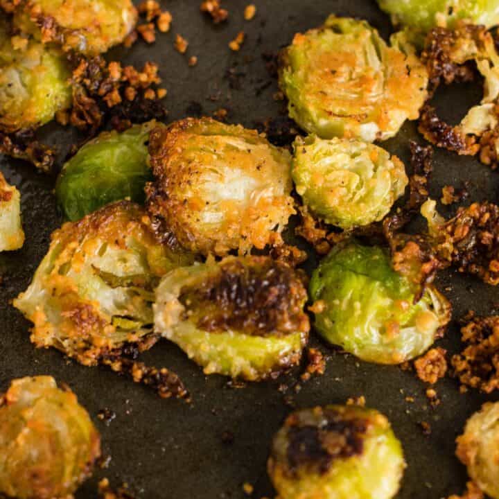 brussel sprout chips on a baking sheet