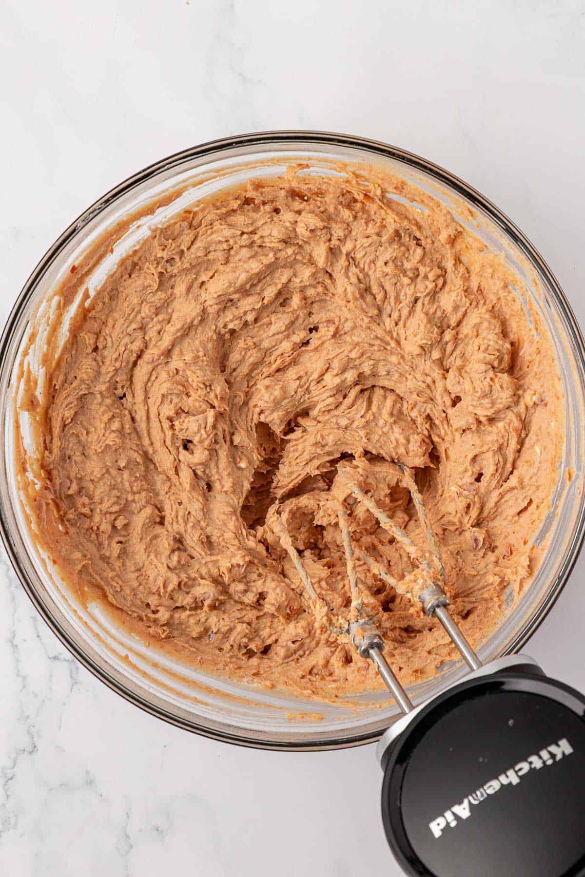 mixing the bean dip ingredients together