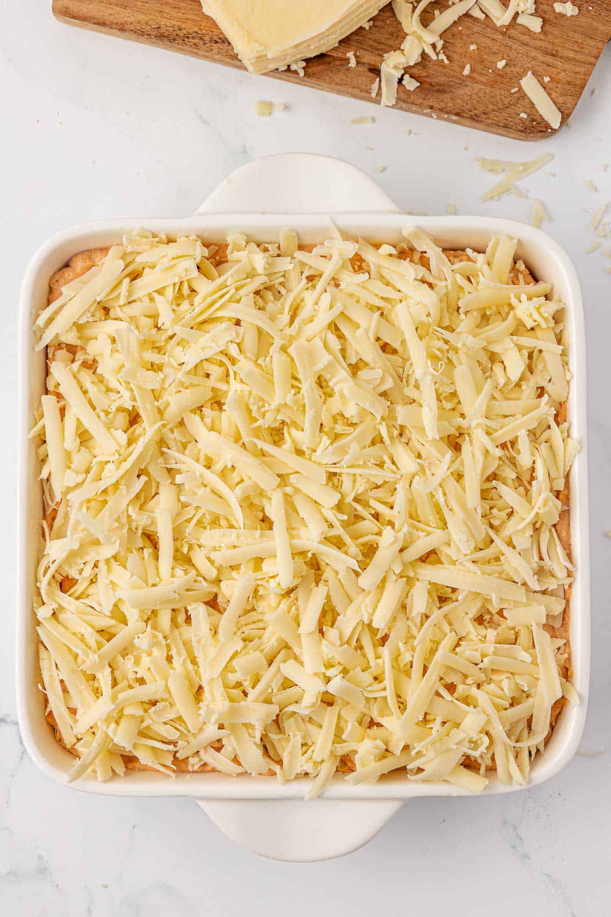 adding the cheese on top