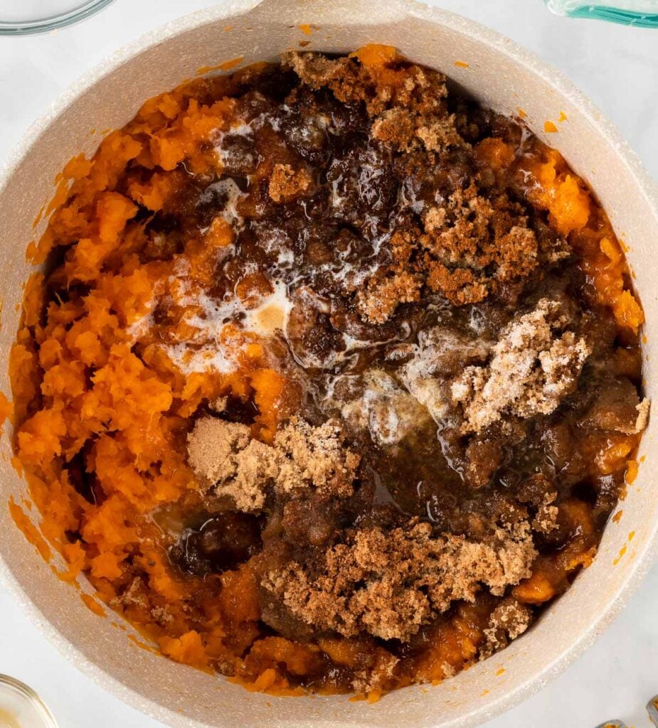 adding the sweetener and spices to mashed sweet potatoes