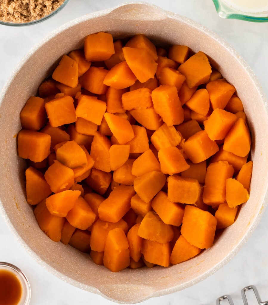 boiled sweet potatoes in a sauce pan