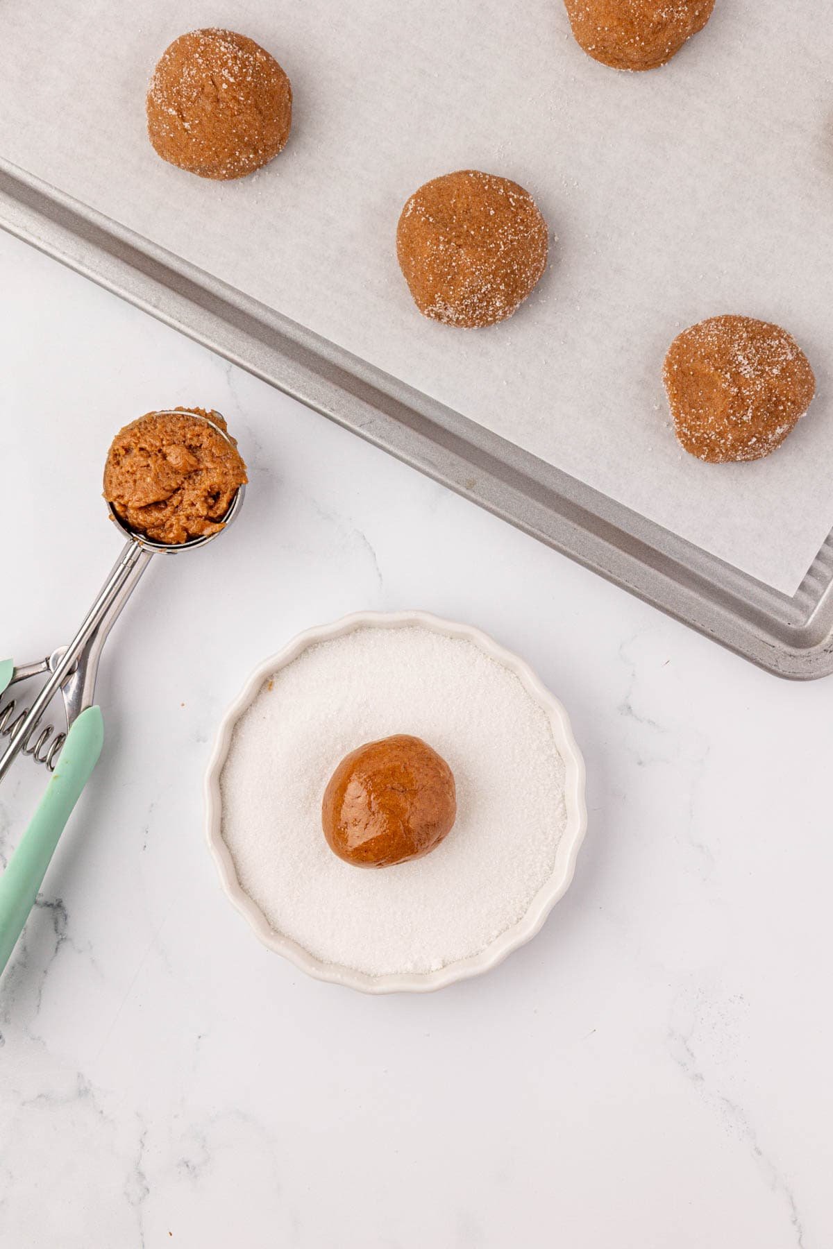 cookie dough ball dipped into sugar