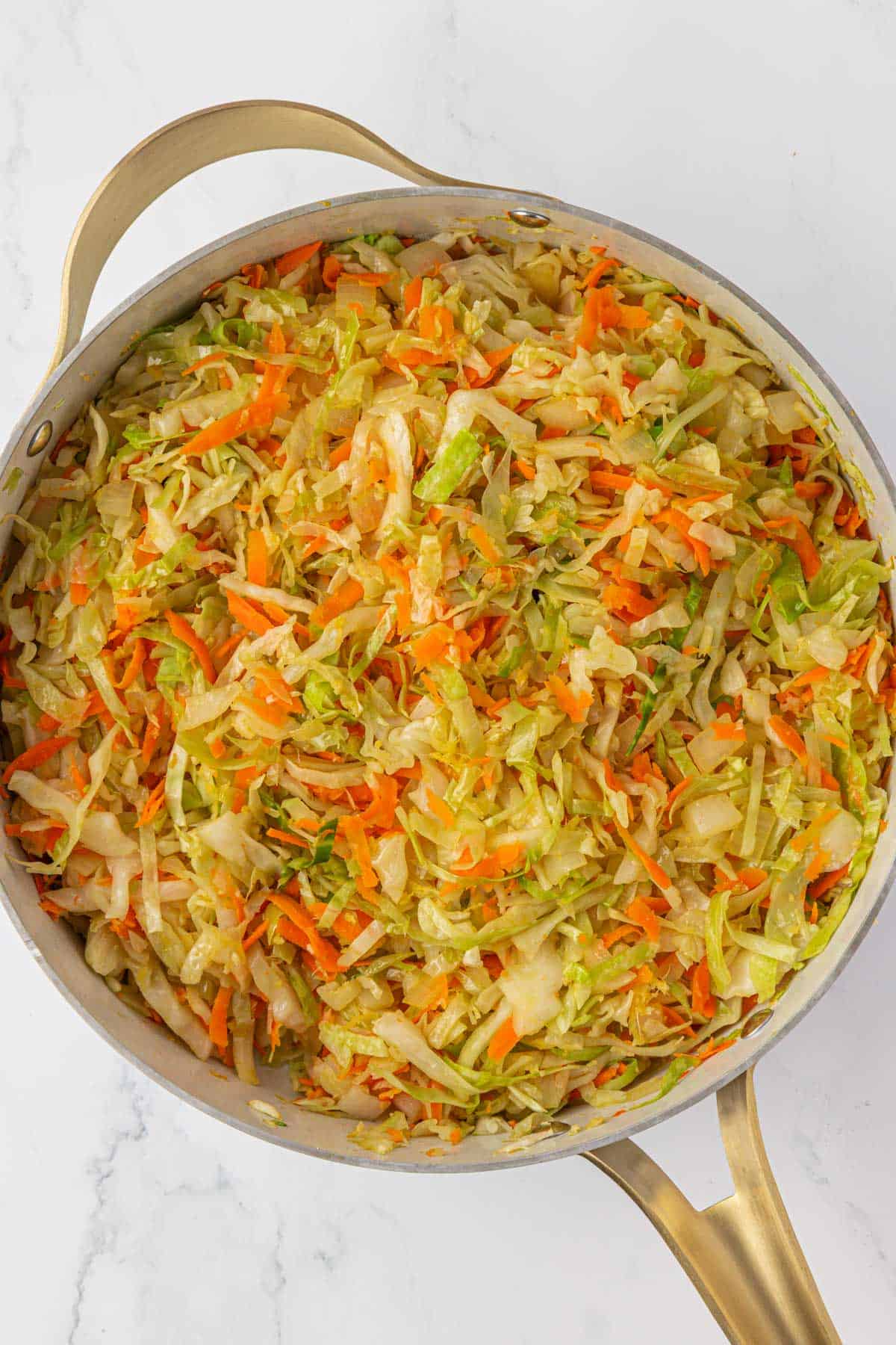 cooked cabbage and carrots