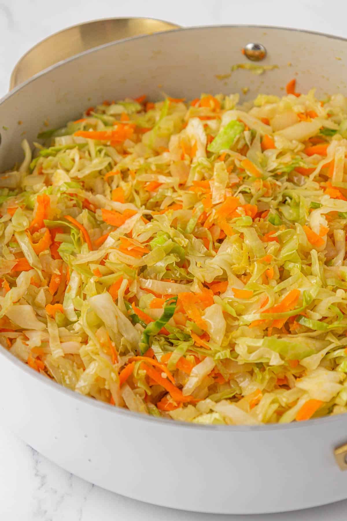 cooked cabbage and carrots